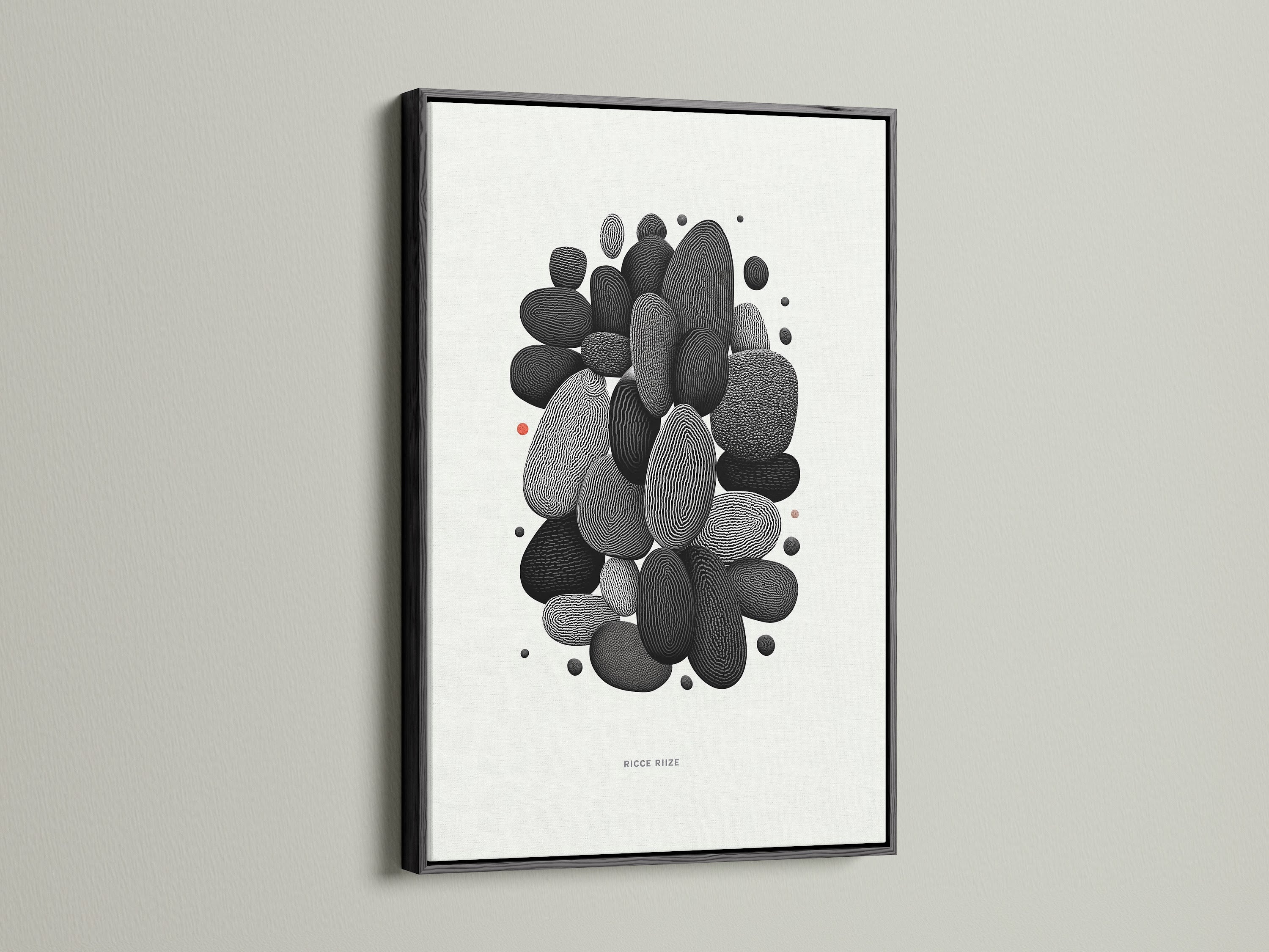 Abstract Pebble artwork showcased in a black frame. This minimalist black and white piece adds sophistication. A modern stone artwork perfect for creating a stylish home decor. Suitable for various interior styles from eclectic to zen.
