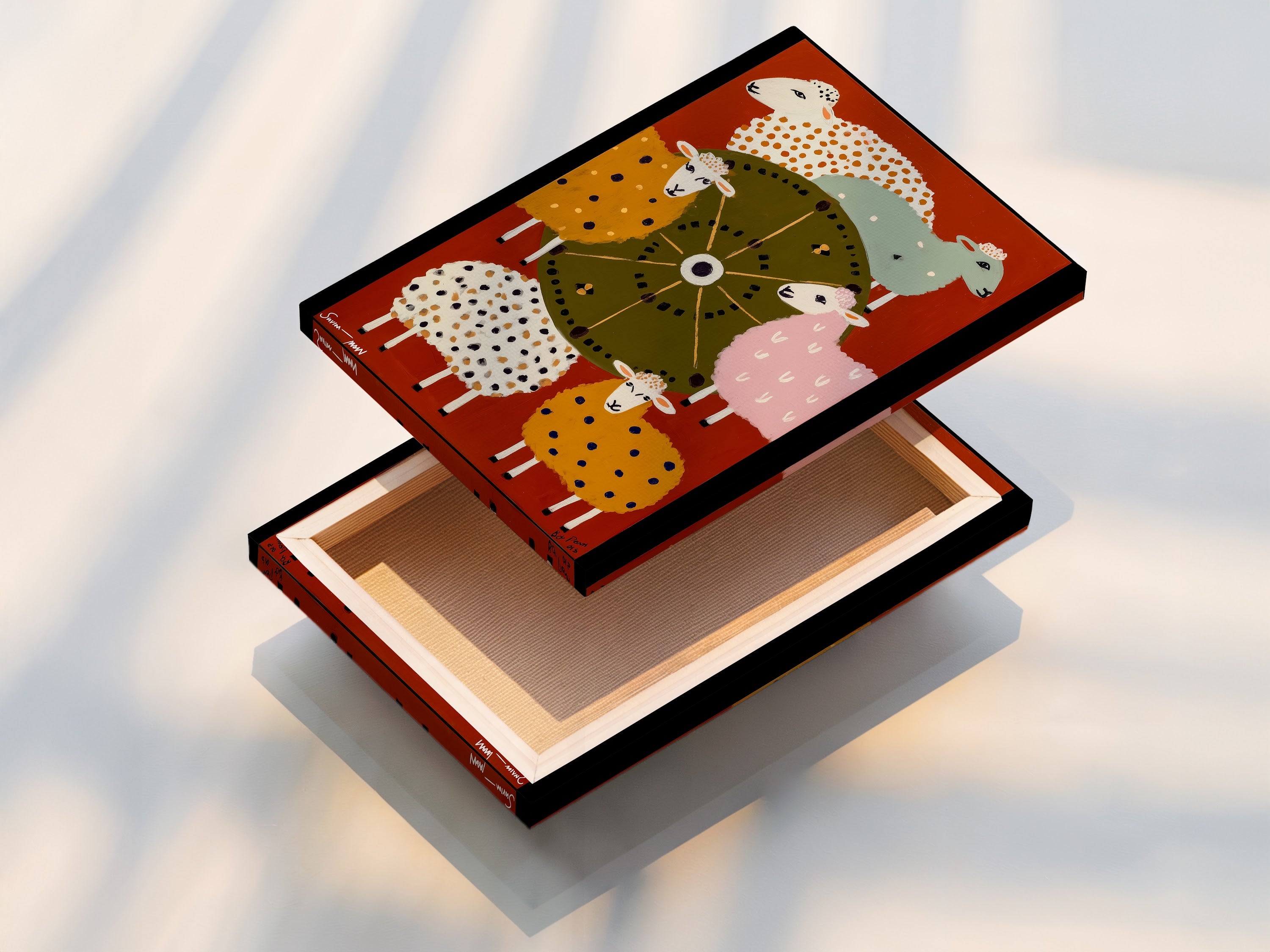 A beautifully stretched canvas print featuring colorful sheep folk art. The canvas texture enhances the artwork adding depth and richness. Ready to hang this piece instantly elevates any room. Perfect for adding a whimsical touch to a nursery or a rustic charm to your kitchen wall.