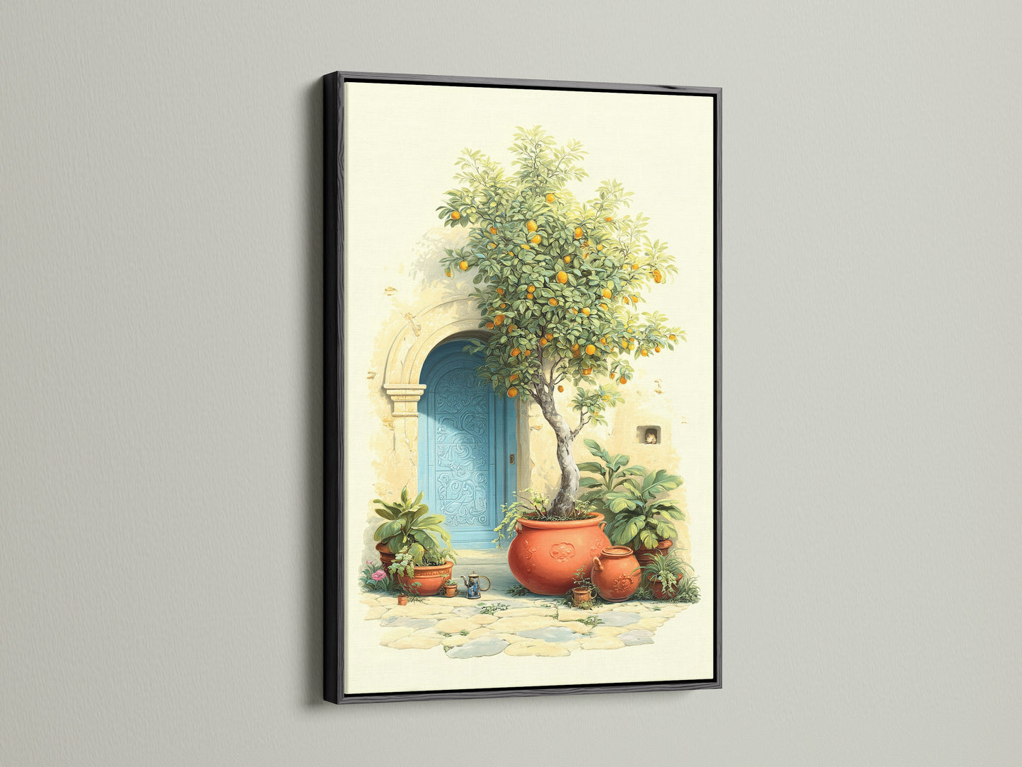 Italian Lemon Tree artwork displayed in a black frame. This Mediterranean art brings Tuscan doorway charm to any room. The canvas print features an azure door terracotta pots and bright citrus adding a touch of Italian garden ambiance to your kitchen or living room.