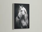 The White Horse Canvas Print is elegantly displayed in a white frame. This monochrome print enhances any space. Perfect for equestrian decor enthusiasts. This animal wall art complements minimalist styles. A sophisticated addition to your home or office. Discover the beauty today.