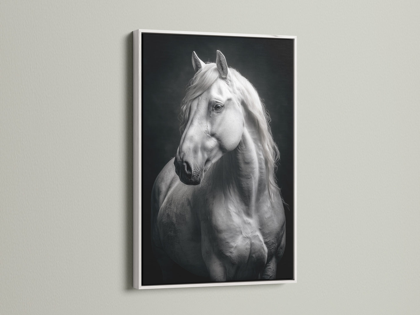 The White Horse Canvas Print is elegantly displayed in a white frame. This monochrome print enhances any space. Perfect for equestrian decor enthusiasts. This animal wall art complements minimalist styles. A sophisticated addition to your home or office. Discover the beauty today.