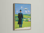 Surreal art print in an oak frame. Mysterious figure looks out onto a landscape with a UFO in the sky. Contemporary art adds a touch of mystery to any room. This piece features primary green and secondary blue colors.