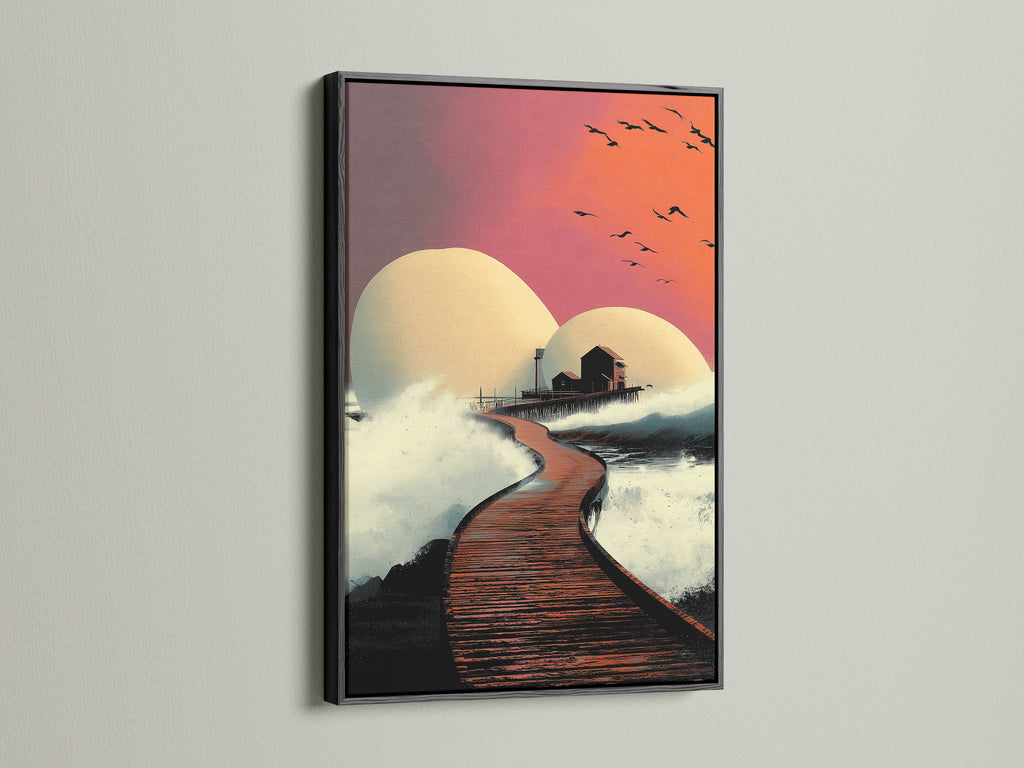 Modern coastal artwork displaying a sunset pier scene in a black frame. This striking seascape print features a house on a pier with an orange and pink sky. Ideal for creating a sophisticated atmosphere. Perfect for homeowners interior decorators and business owners. Add elegance with this ocean canvas.