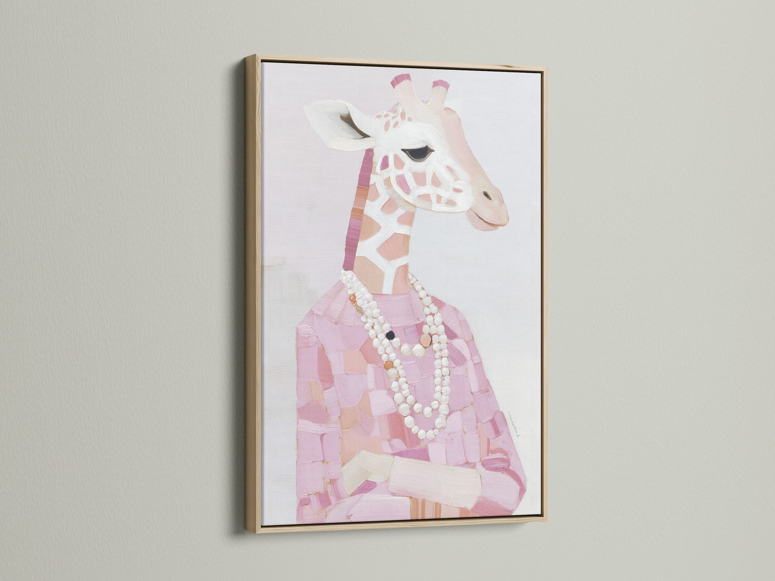 An oak frame showcases a Giraffe Portrait Canvas Print. The pink animal print adds a touch of fashion. Pearl necklace art enhances this nursery wall decor. The oak frame complements the blush pink art beautifully. This stylish animal art is a must-have.