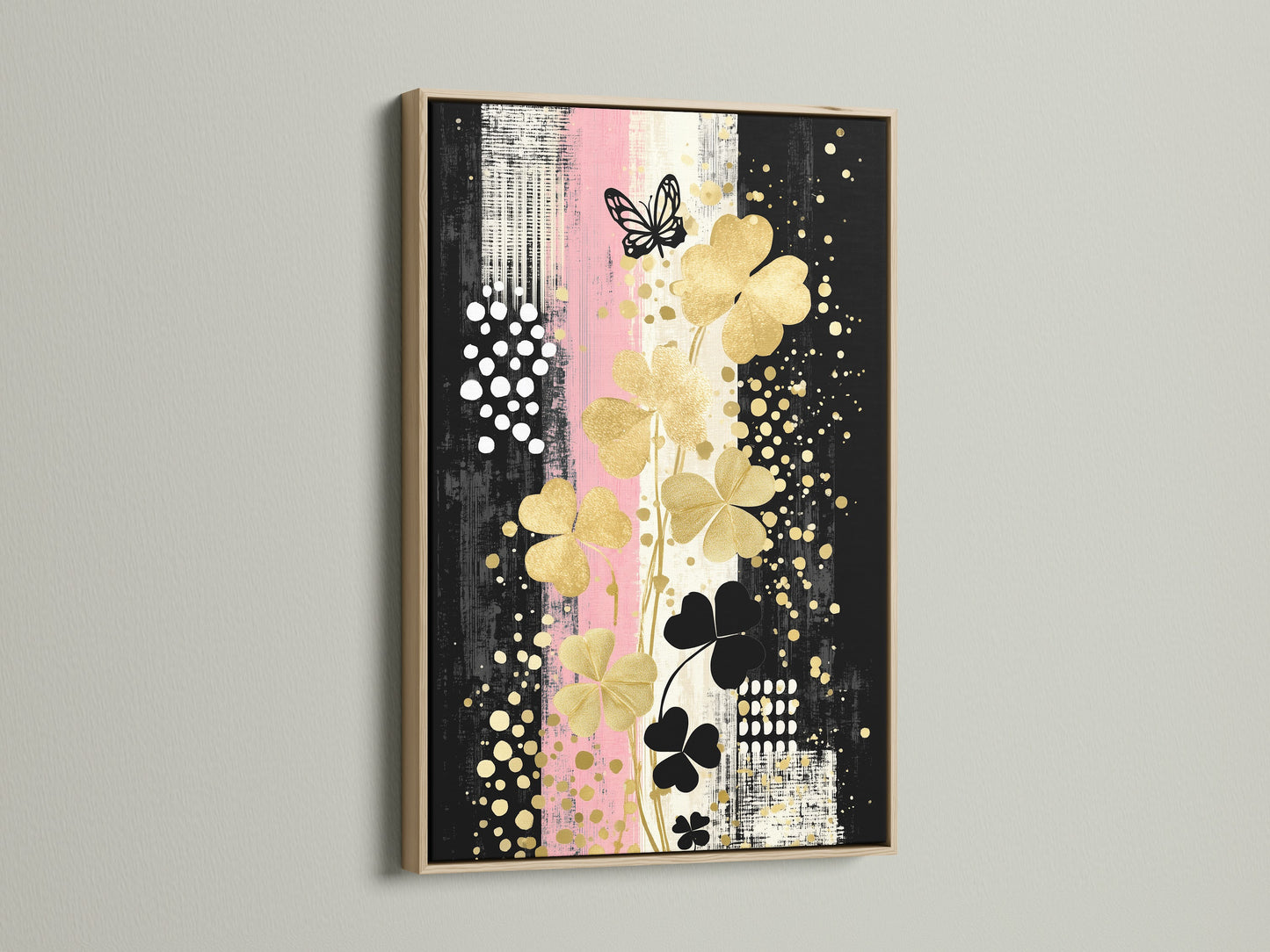 Clover Canvas Print art displayed in an oak frame. The gold and black floral design adds a touch of modern elegance. Perfect wall decor for minimalist and Scandinavian styles.