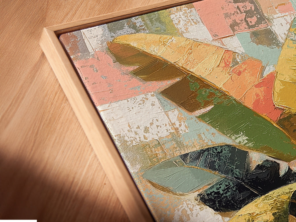 A close-up angled view of a canvas print in a floating frame. Abstract palm leaf artwork adds a modern touch. The tropical plant art is perfect for bedroom wall art. A green plant print to elevate decor.