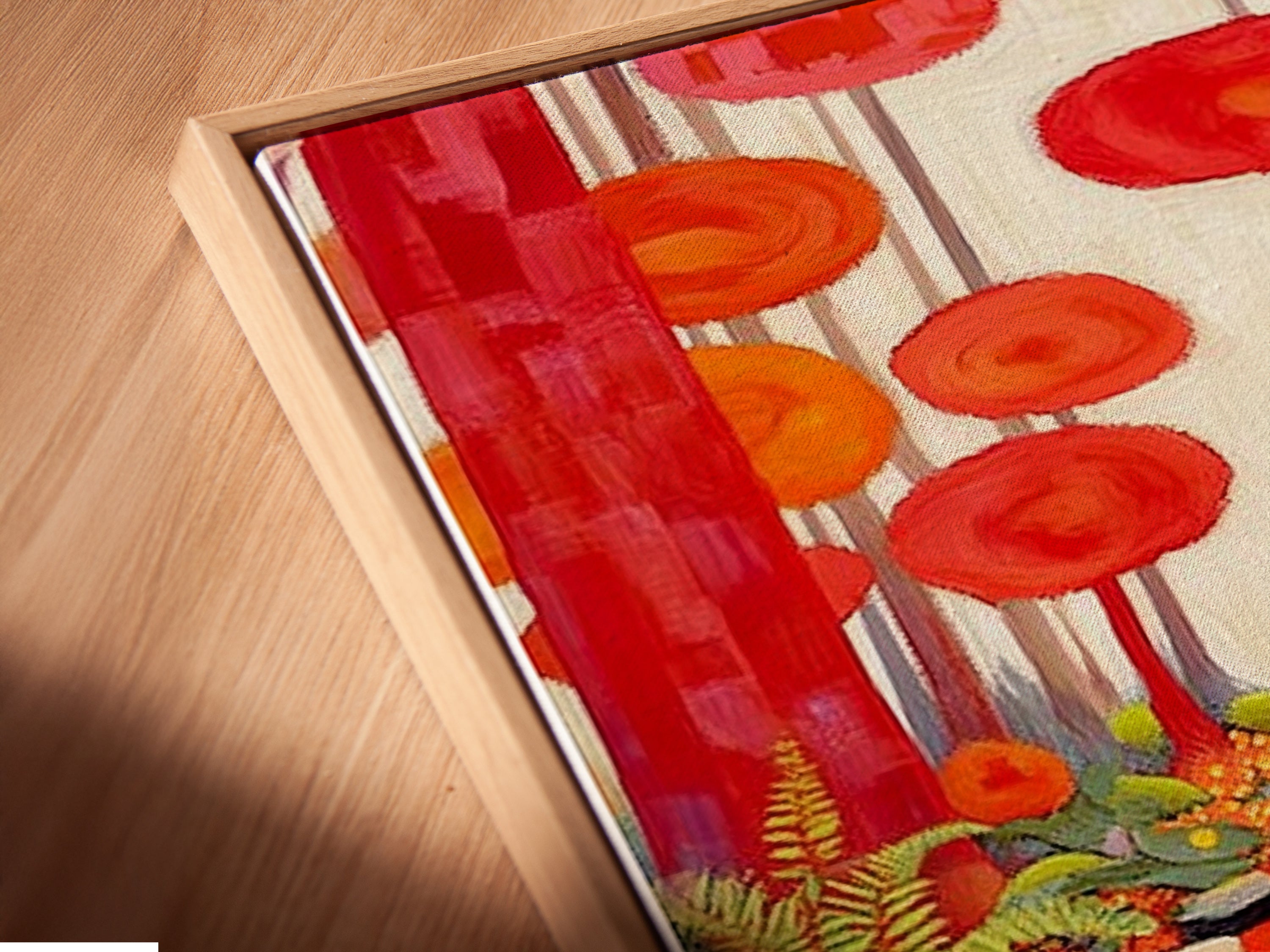 A close-up of the Enchanted Forest canvas print in a floating frame. The floating frame gives the artwork a modern gallery look. It enhances the colorful trees and whimsical art. See the fine details of this nature print. Perfect for showcasing vibrant artwork in your home. It will look great in your space.