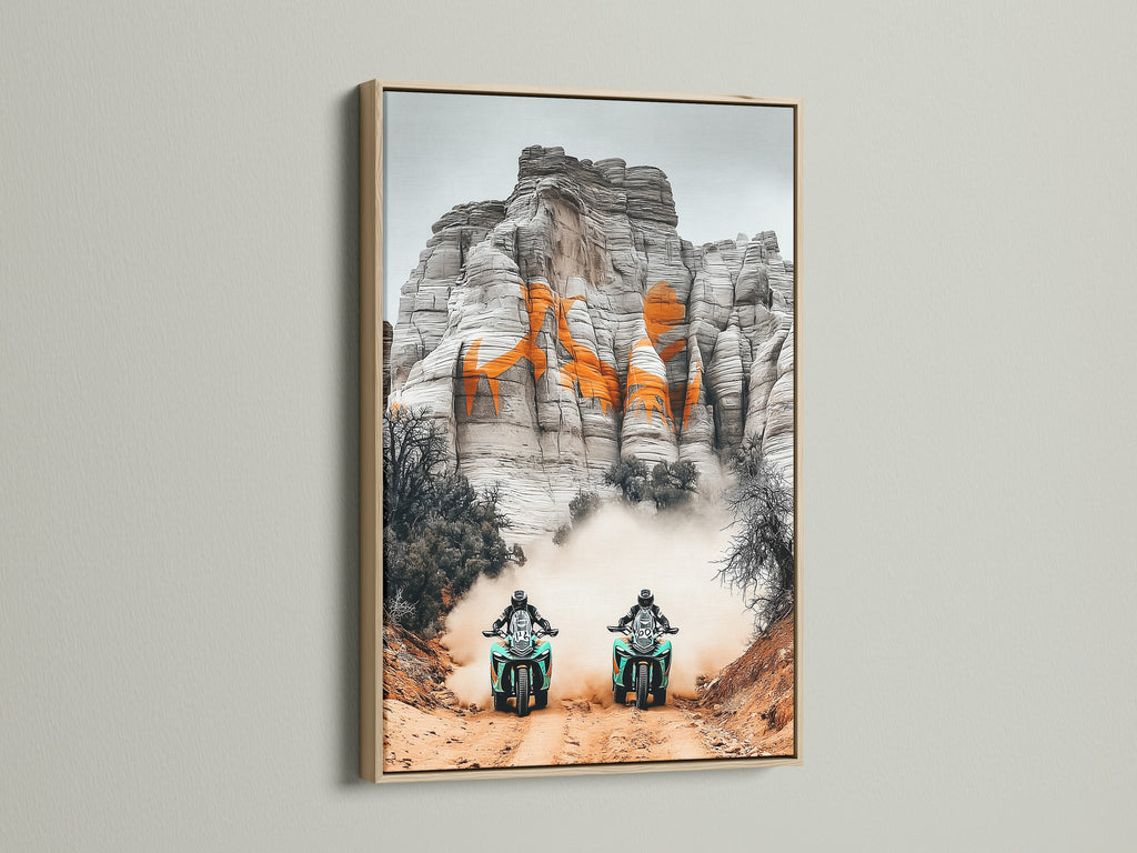 Enhance your decor with desert adventure art. This motorcycle wall art is showcased in an oak frame. Ideal sports canvas print for man cave decor. Homeowners and renters will love this off road racing artwork. Add a touch of adventure artwork to your office or garage with this desert landscape motorcycle print.
