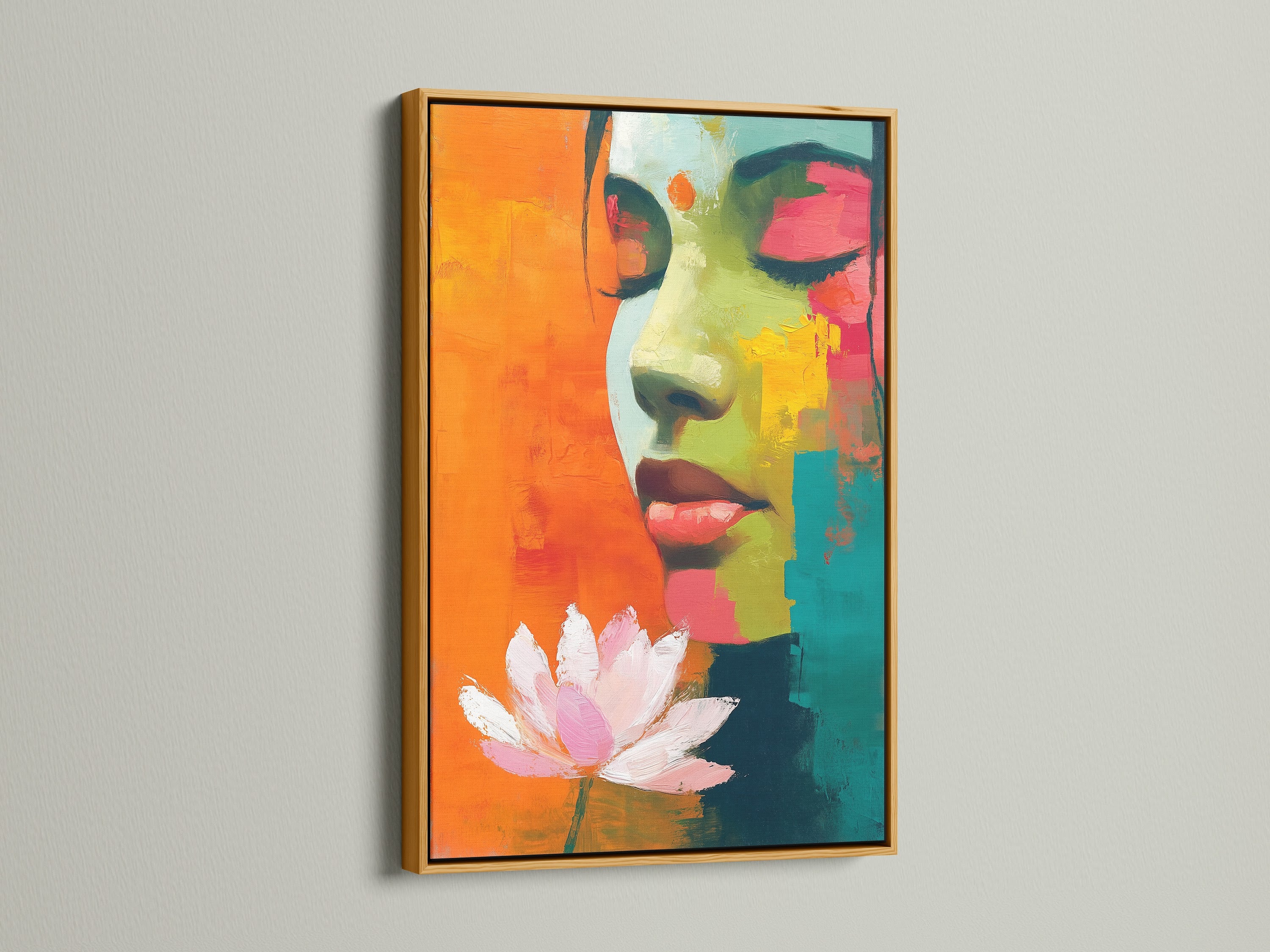 This gold frame enhances the woman portrait art. The abstract face print and lotus flower details are eye-catching. This artwork adds a luxurious touch to any room. Discover how gold frames elevate colorful art.