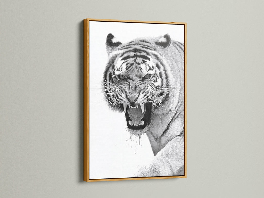 The tiger artwork is presented in a luxurious gold frame. The gold frame adds a touch of opulence to the art piece. It creates a focal point that is eye catching and elegant. This artwork elevates your home decor. It brings warmth and sophistication to your space.