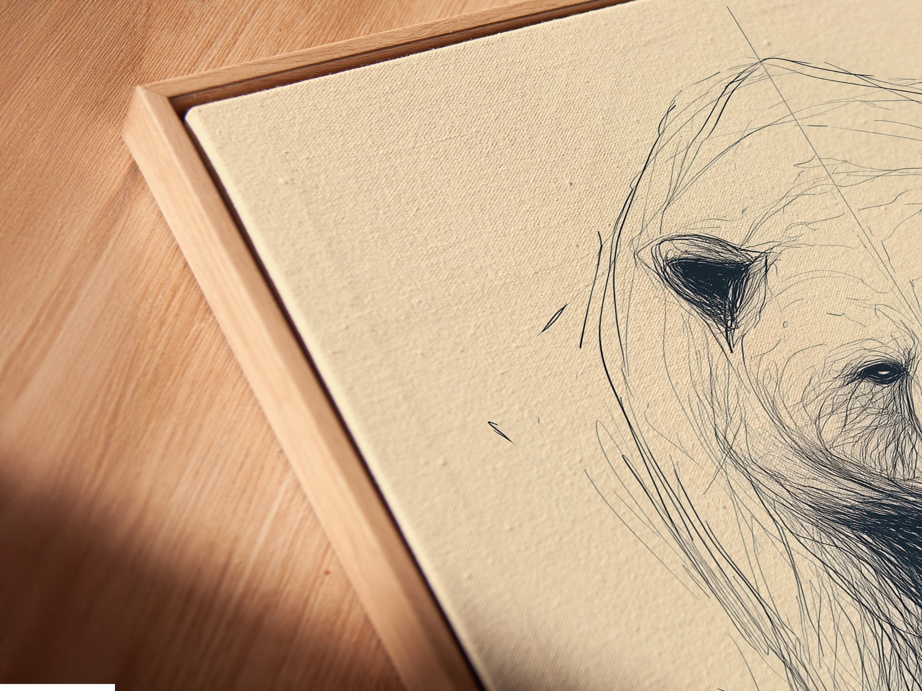 Close-up of a framed bear art print. The floating frame adds depth to the minimalist wildlife sketch. This animal drawing is perfect for adding a touch of nature to your space. Ideal for rustic and primitive style decor. The bear artwork is a vintage-inspired piece.