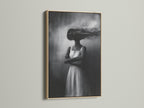 A striking surreal woman artwork is showcased in an oak frame. This black and white photography canvas adds modern style. Perfect as dreamy wall art for bedroom decor. Explore this fine art print now