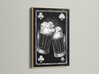 Framed artwork featuring a playing card beer mug art print. The artwork is framed in an oak frame. The oak frame enhances the vintage feel of the artwork. A great addition to any home decor.