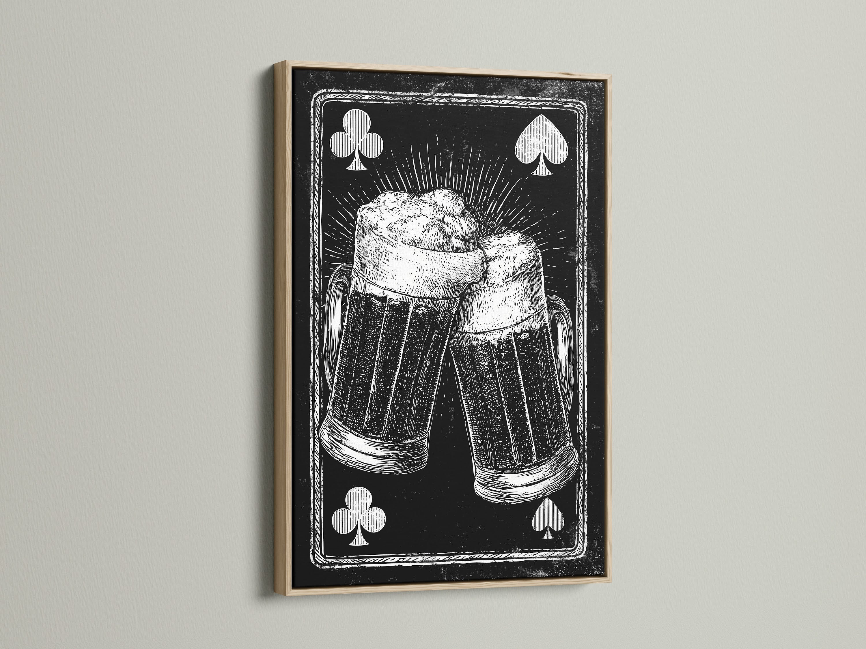Framed artwork featuring a playing card beer mug art print. The artwork is framed in an oak frame. The oak frame enhances the vintage feel of the artwork. A great addition to any home decor.