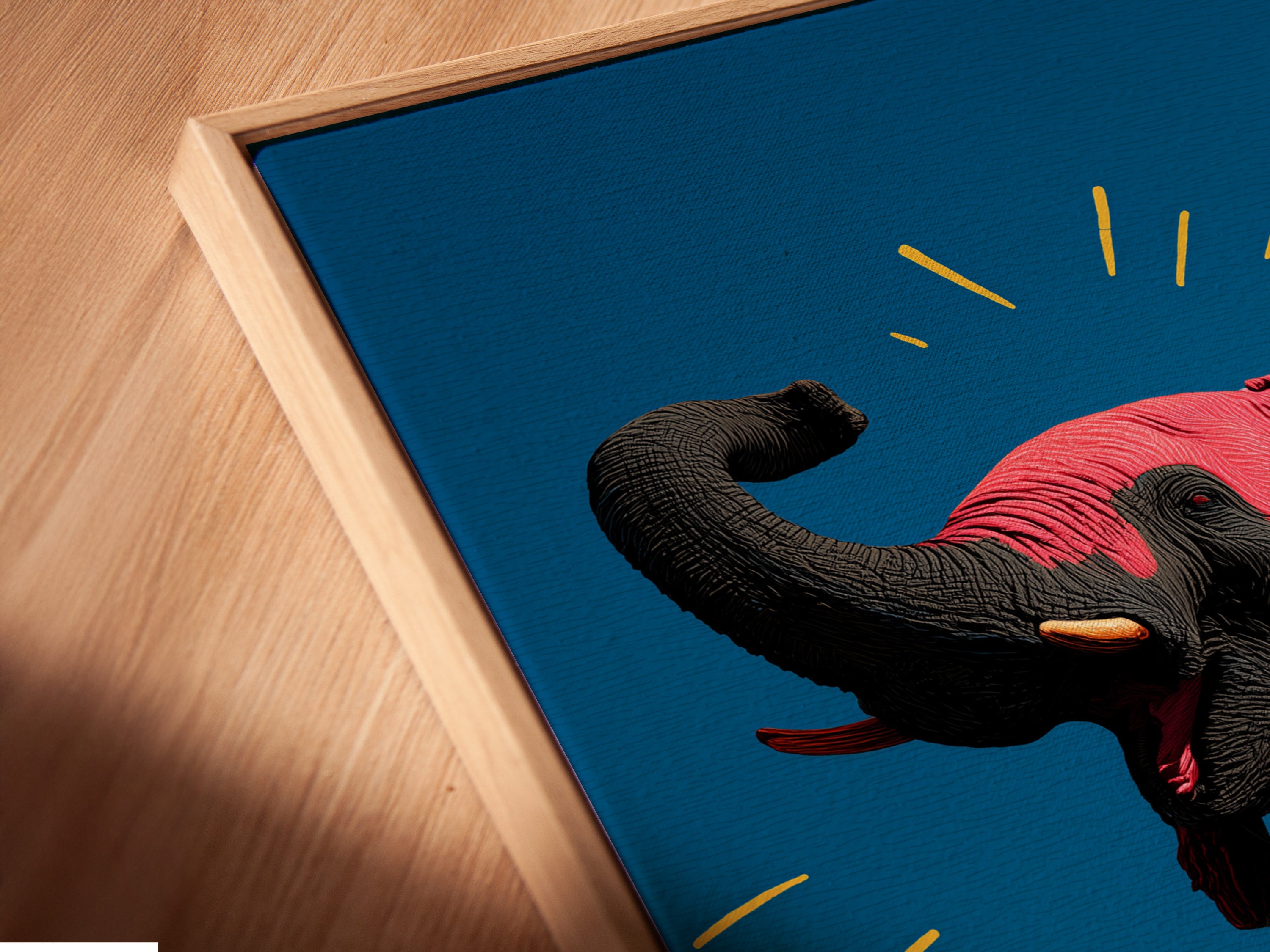 Close-up of a canvas print featuring a pink elephant in a floating frame. This contemporary animal artwork adds a modern touch to any room. The vibrant pop art style is perfect for nursery or office decor. The floating frame gives the artwork a sophisticated and gallery-like appearance.