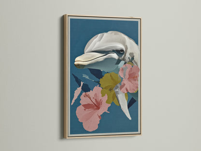 Whale botanical art print in an oak frame. This artwork features a whale and tropical hibiscus flowers. It's perfect for coastal wall decor. The ocean animal print adds a touch of marine life art.