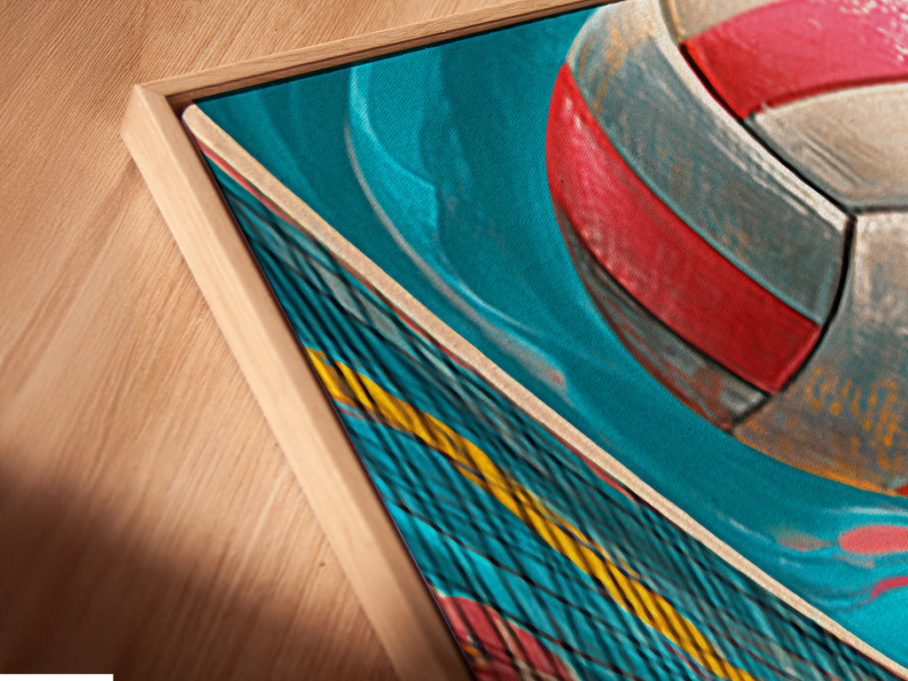 Angled close-up of a volleyball canvas print in a floating frame. This beach sport art enhances teen room decor. This fun game artwork adds a vibrant touch. The sand court print brings a summer vibe. The pink and blue hues are modern.