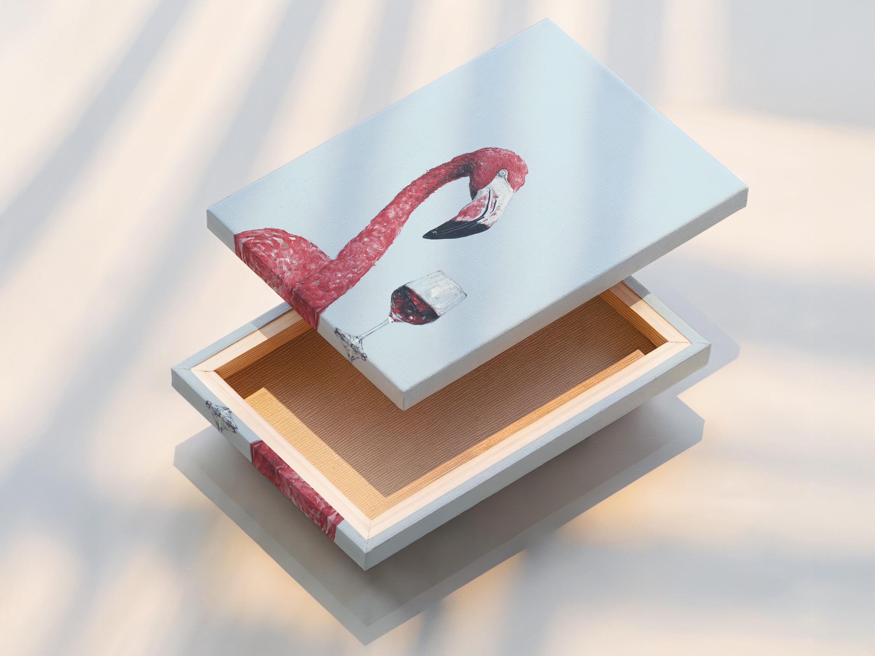 A stretched canvas print featuring a pink flamingo with wine. This animal artwork is ready to hang in your home. Enjoy vibrant colors and detailed artwork in your space.