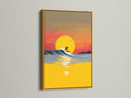 Infuse your space with golden hour vibes. This Surfing Canvas Print features a surfer riding a wave at sunset. The artwork is framed in a luxurious gold frame. This ocean canvas adds a touch of summer to any room. A perfect surfer gift for coastal decor enthusiasts.