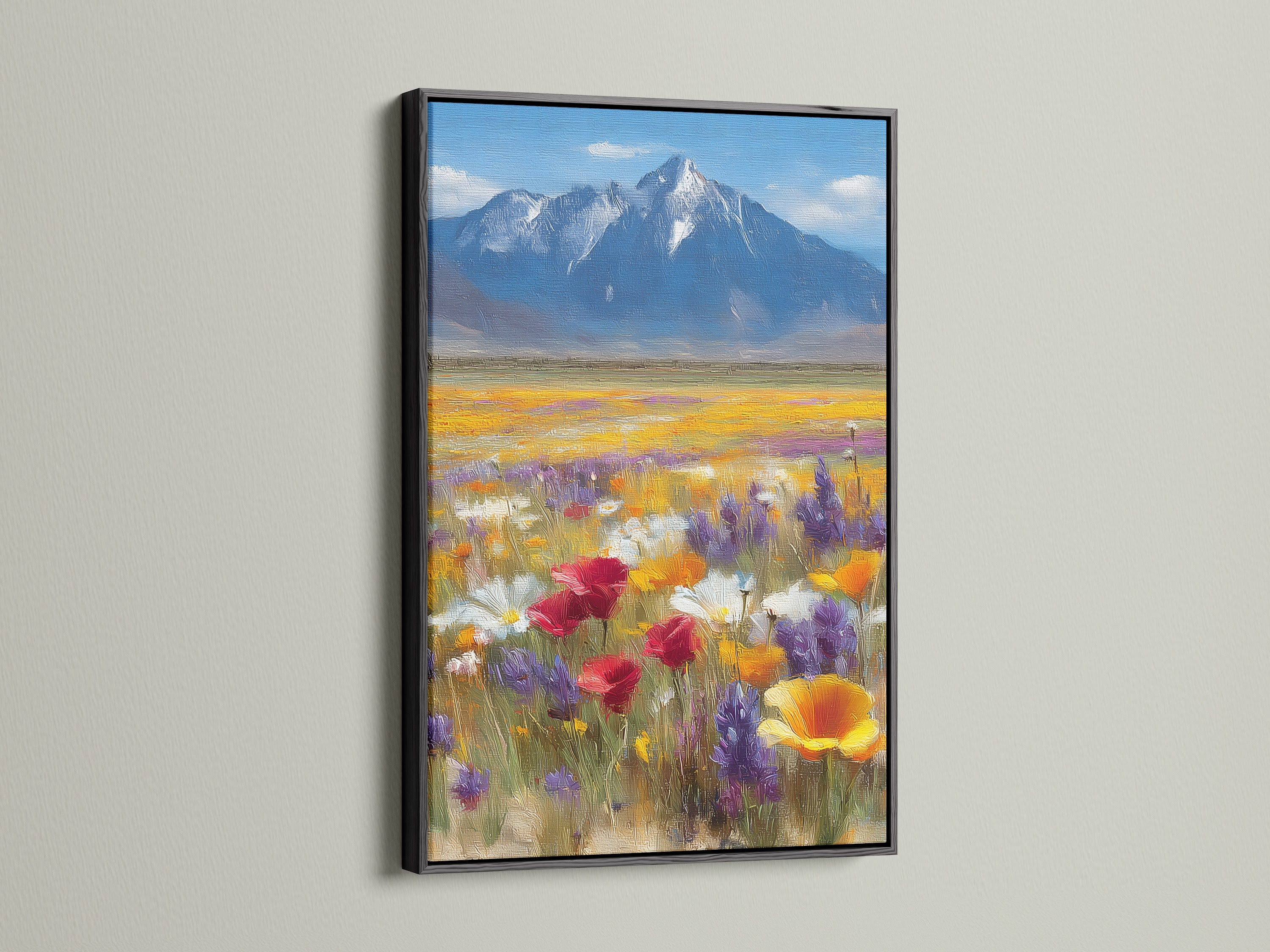 Wildflower meadow canvas print showcased in a black frame. This mountain landscape artwork is a stunning focal point. The black frame adds a touch of sophistication. The colorful poppy field painting enhances bedroom decor. Ideal for those seeking refined and vibrant wall art. Bring nature indoors with our botanical art.