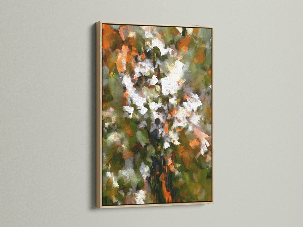 This abstract floral art is displayed in an oak frame. The print features orange green and white hues. It brings a touch of nature indoors. Ideal for living rooms bedrooms or hallways. Enhance your home decor with this botanical canvas.