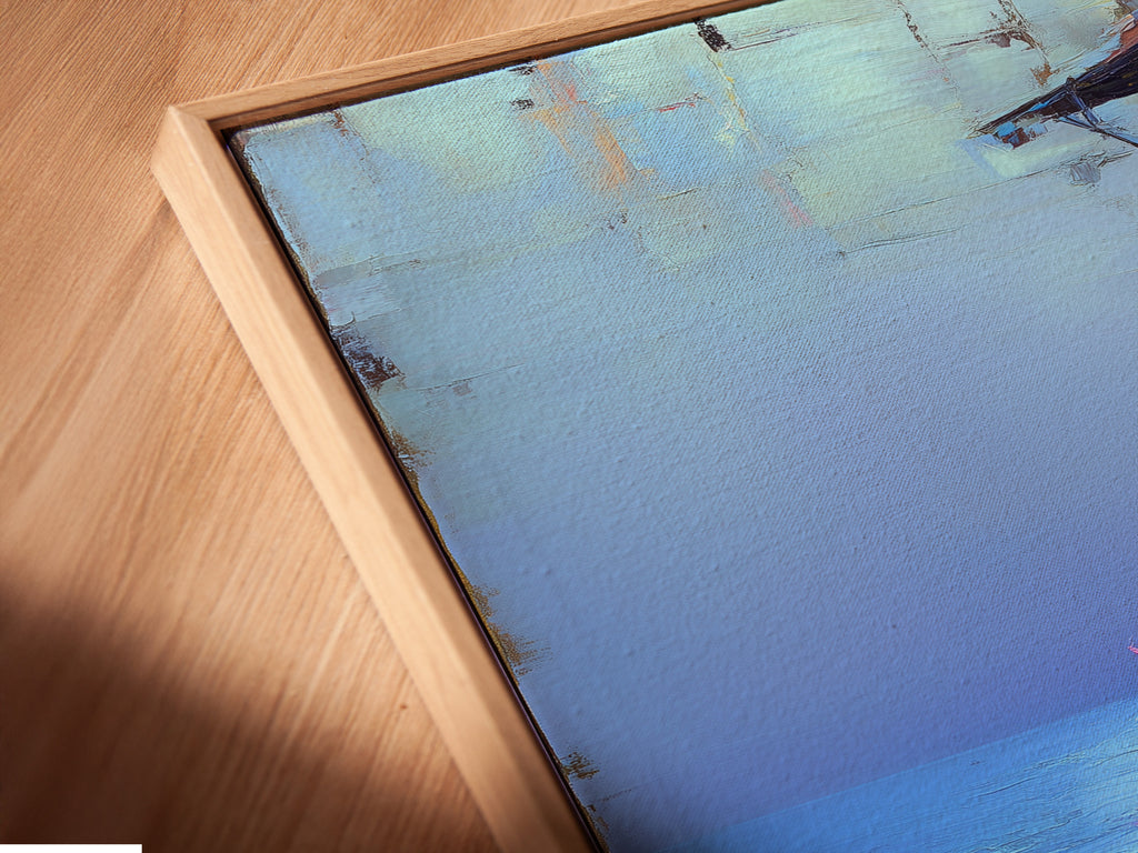 This is a close-up angled view of a canvas print set in a floating frame. The Mediterranean Balcony artwork enhances coastal decor. It is a blue ocean painting for bedroom wall decor.