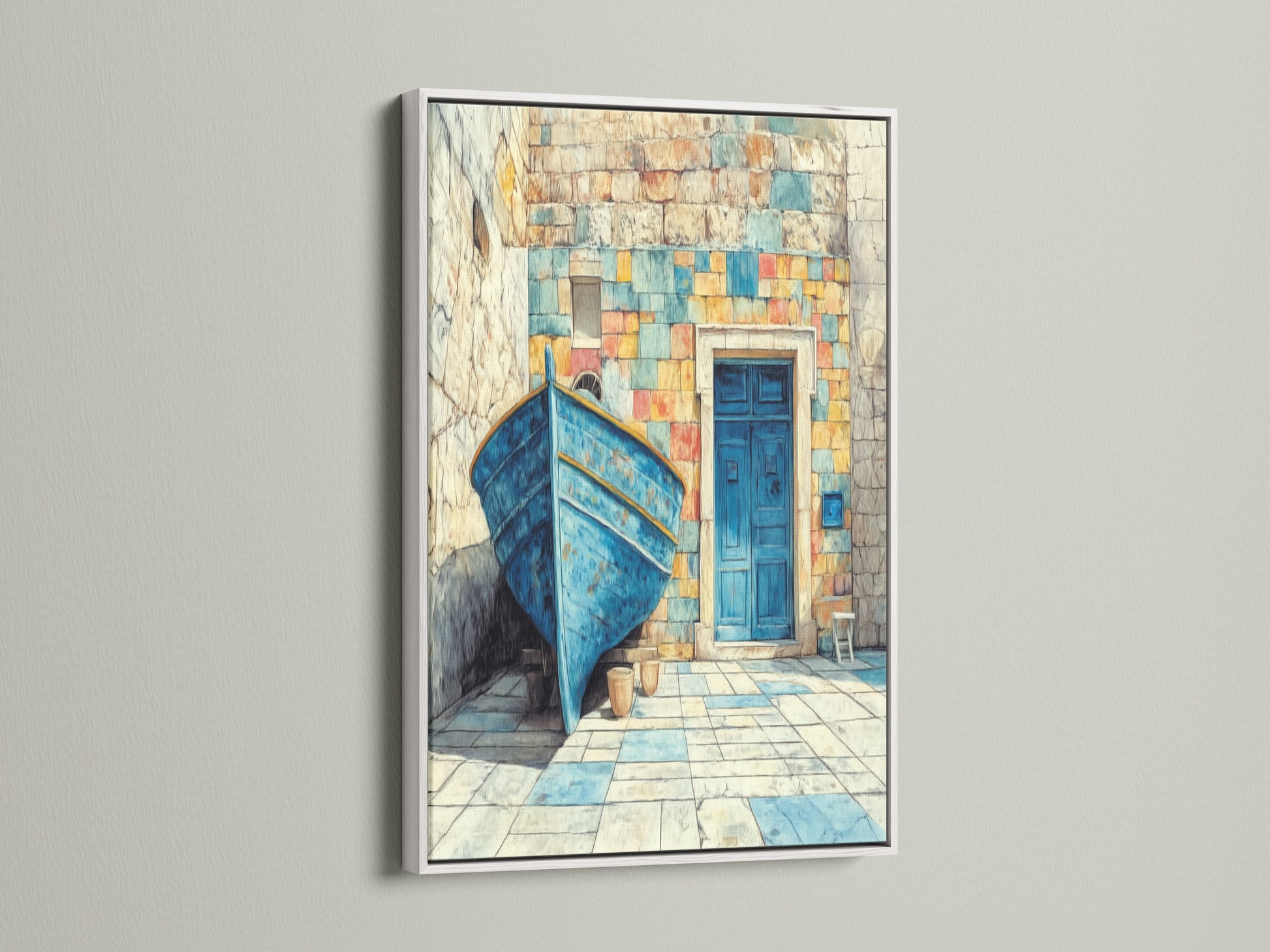 A white frame highlights this Coastal Boat Canvas Print. This Mediterranean artwork brings a turquoise blue accent to any room. Nautical decor is perfect for a vacation home. The seaside artwork evokes summer vibes.