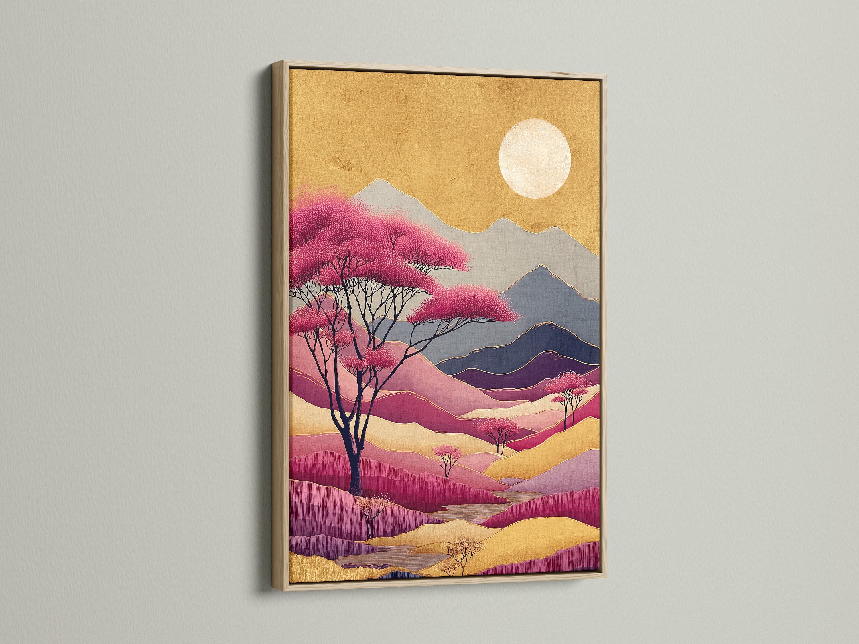 Pink and purple Abstract Mountain Artwork in an oak frame. This modern nature print adds elegance to any room. It's ideal for contemporary decor. The sunset landscape creates a calming atmosphere. It can be used in living rooms or bedrooms.