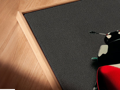 Close up of a canvas print in a floating frame. The ladybug art looks stunning with this modern framing option. The red beetle and black spots are vivid and eye catching. Ideal for kids rooms dorms or contemporary spaces.