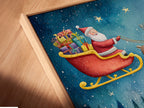 A close-up angled view of the Santa's Sleigh canvas print in a floating frame. The watercolor art is beautifully displayed. It's perfect for adding a festive touch to your home. This holiday wall art is stunning.