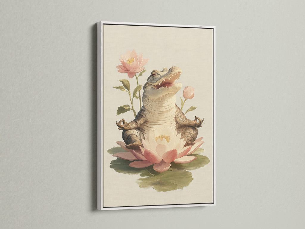 Zen Alligator art print with a white frame. The artwork features an alligator meditating on a lotus flower. The white frame provides a clean look. This whimsical art is perfect for a meditation room or yoga studio decor.