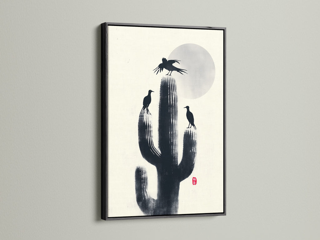Cactus Birds silhouette art in a black frame. Southwestern decor enhances any study room. The monochrome print features a cactus and birds. This nature canvas is a minimalist statement piece for your home.