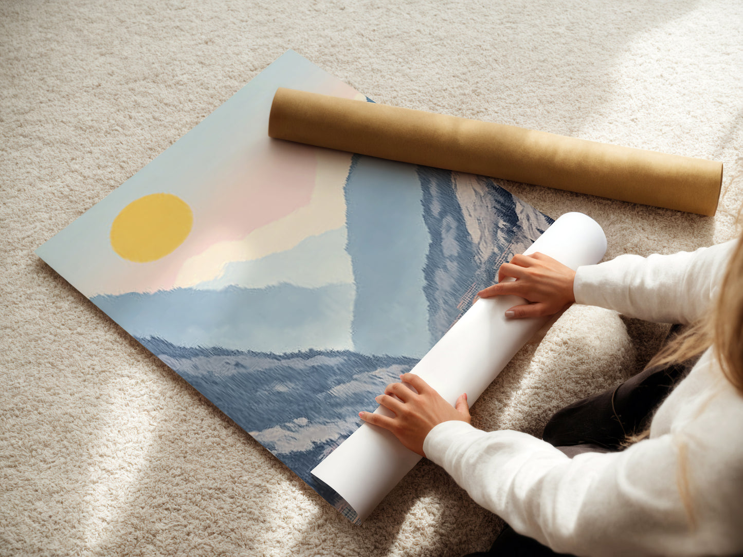 A woman is carefully rolling a fine art poster paper. This showcases the quality and care in handling our artwork. Our mountain lake art and serene valley landscapes are printed on premium materials. Perfect for creating stunning wall decor in any space. Explore our pastel artwork.