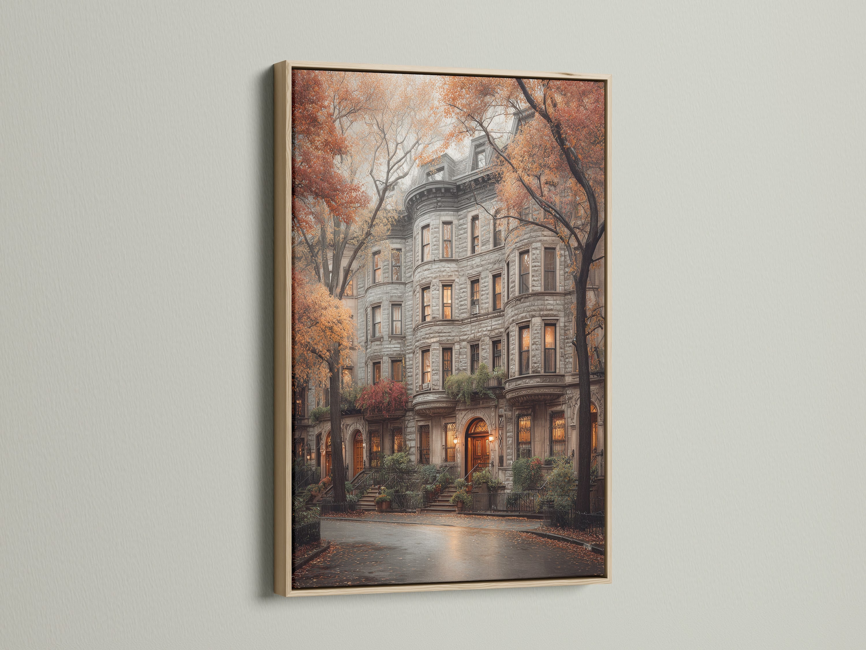 An oak frame holds a vintage style architecture poster.  The artwork depicts an autumn cityscape. This brownstone art is ideal for living rooms or office wall decor. It suits traditional and eclectic styles.