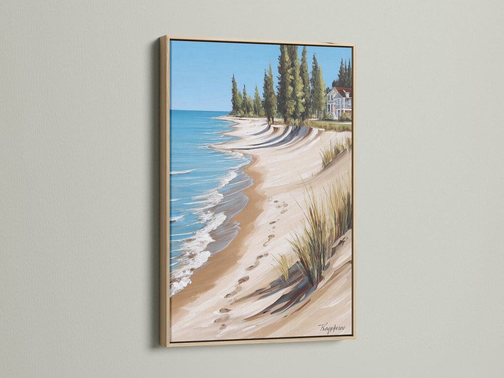 Coastal Beach House Artwork in an Oak Frame. This artwork showcases a calming ocean view with a sandy shoreline. Ideal beach house art for creating a relaxing atmosphere. Perfect for renters and business owners.