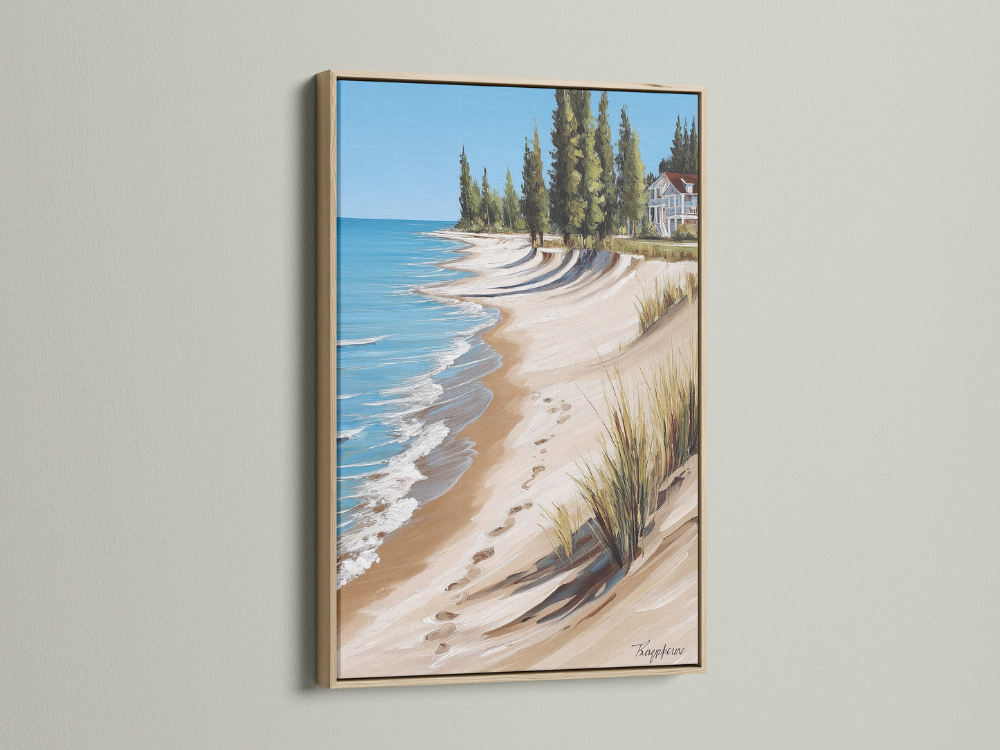Coastal Beach House Artwork in an Oak Frame. This artwork showcases a calming ocean view with a sandy shoreline. Ideal beach house art for creating a relaxing atmosphere. Perfect for renters and business owners.