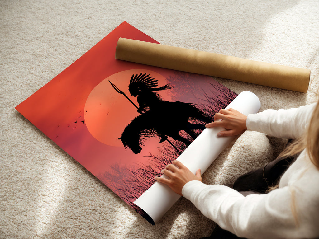 A woman is carefully rolling a fine art poster paper. The poster features an artwork of an indigenous person on horseback at sunset. We use high-quality materials. Our fine art posters ensure lasting beauty. Order your favorite art today.