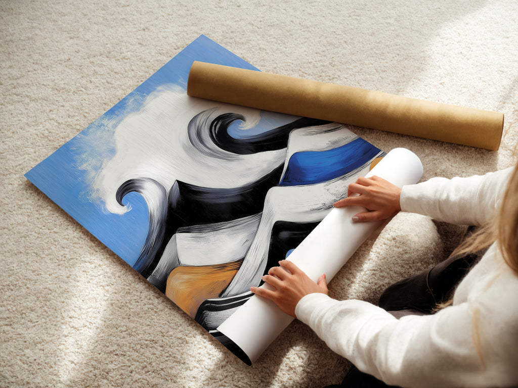 A woman is carefully rolling a fine art poster paper. This paper displays the ocean wave artwork. The abstract seascape features blue and orange colors. Get ready to frame and showcase this coastal art print.