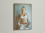 Fitness Motivation Canvas Print displayed in an oak frame. The artwork shows a strong woman with dumbbells. This motivational artwork enhances any workout environment. Perfect for home gym decor and fitness studios.