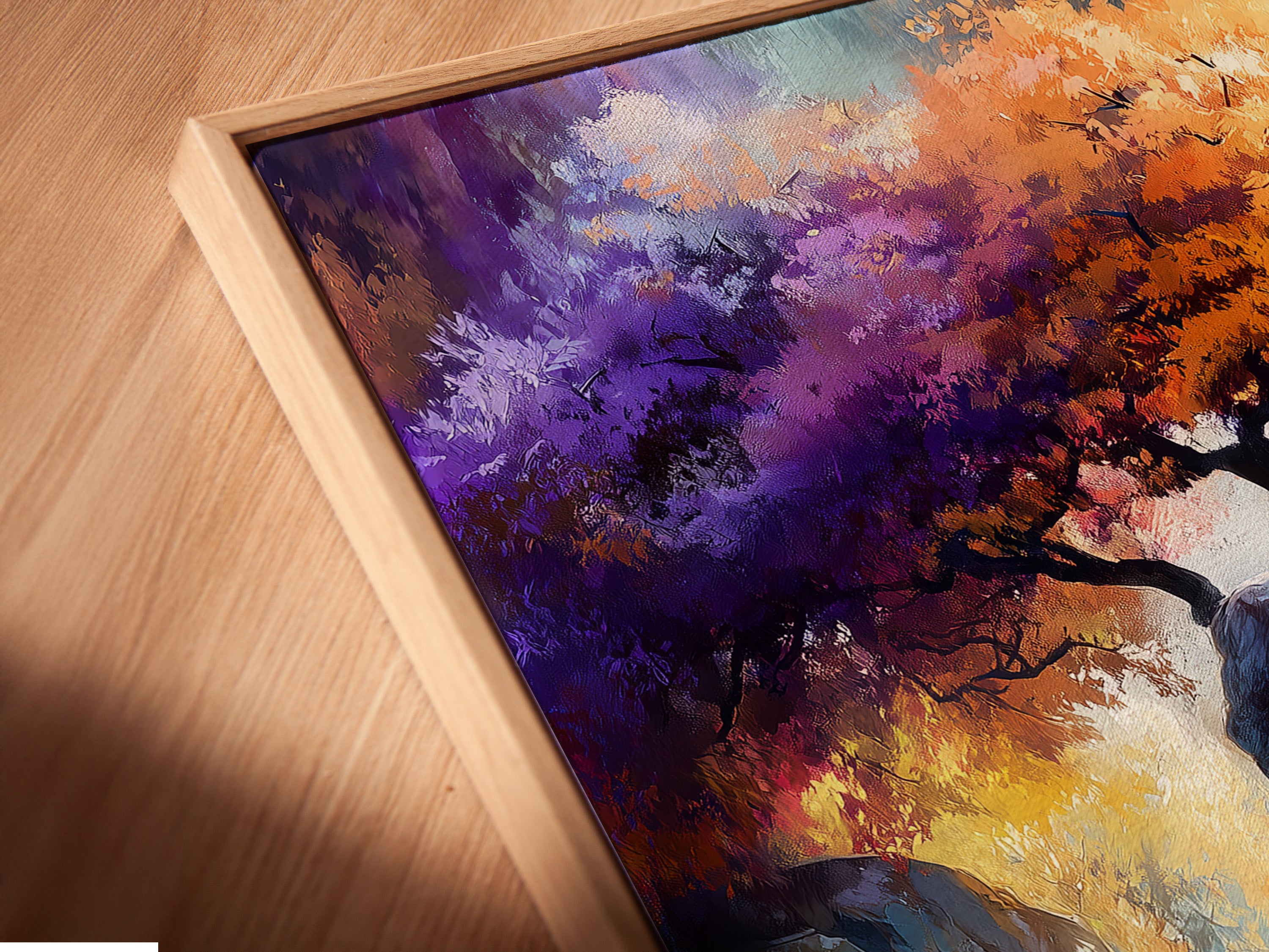 Close-up of a canvas print in a floating frame. The mystical tree artwork is beautifully displayed. This fantasy landscape wall art adds depth to the room. The colorful nature artwork is ready to hang and enjoy.