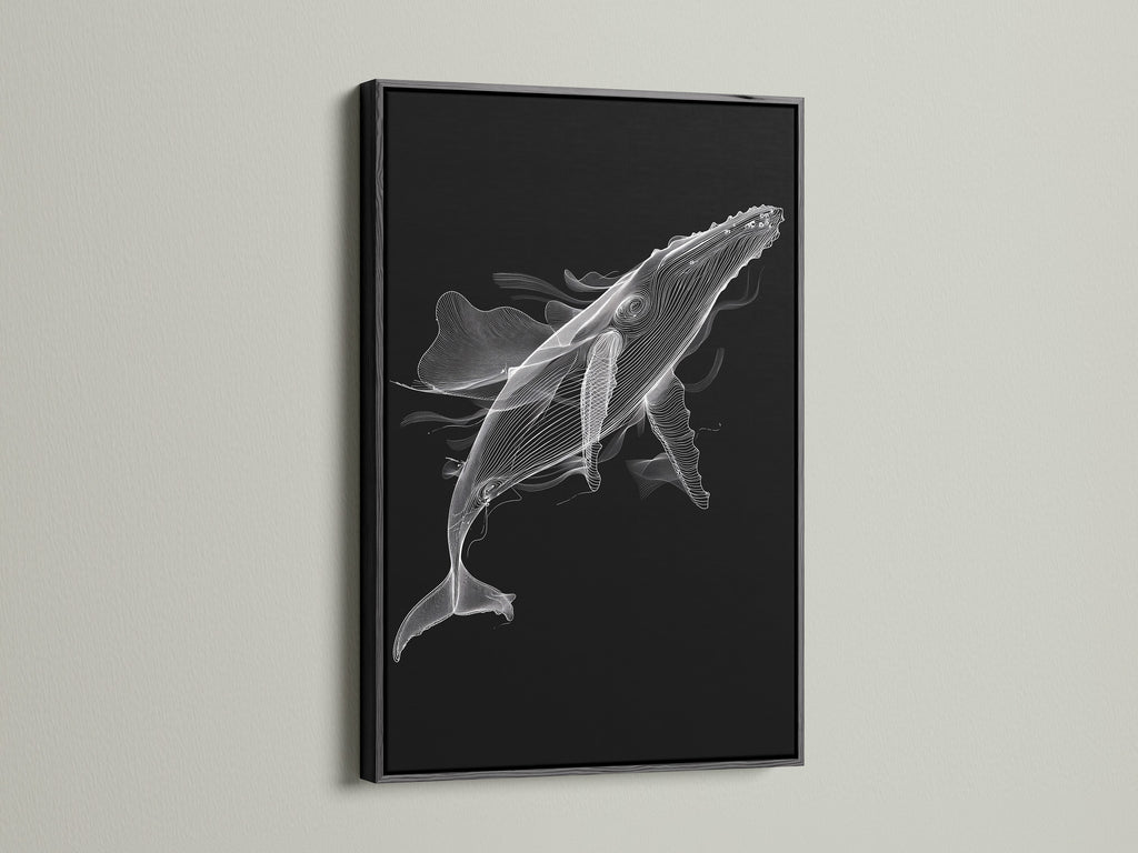 Displayed is a black and white whale artwork in a sleek black frame. This minimalist ocean canvas print offers a bold statement. Perfect for creating a modern and sophisticated space. The black frame adds contrast to the whale artwork. Enhance your living room wall art today.