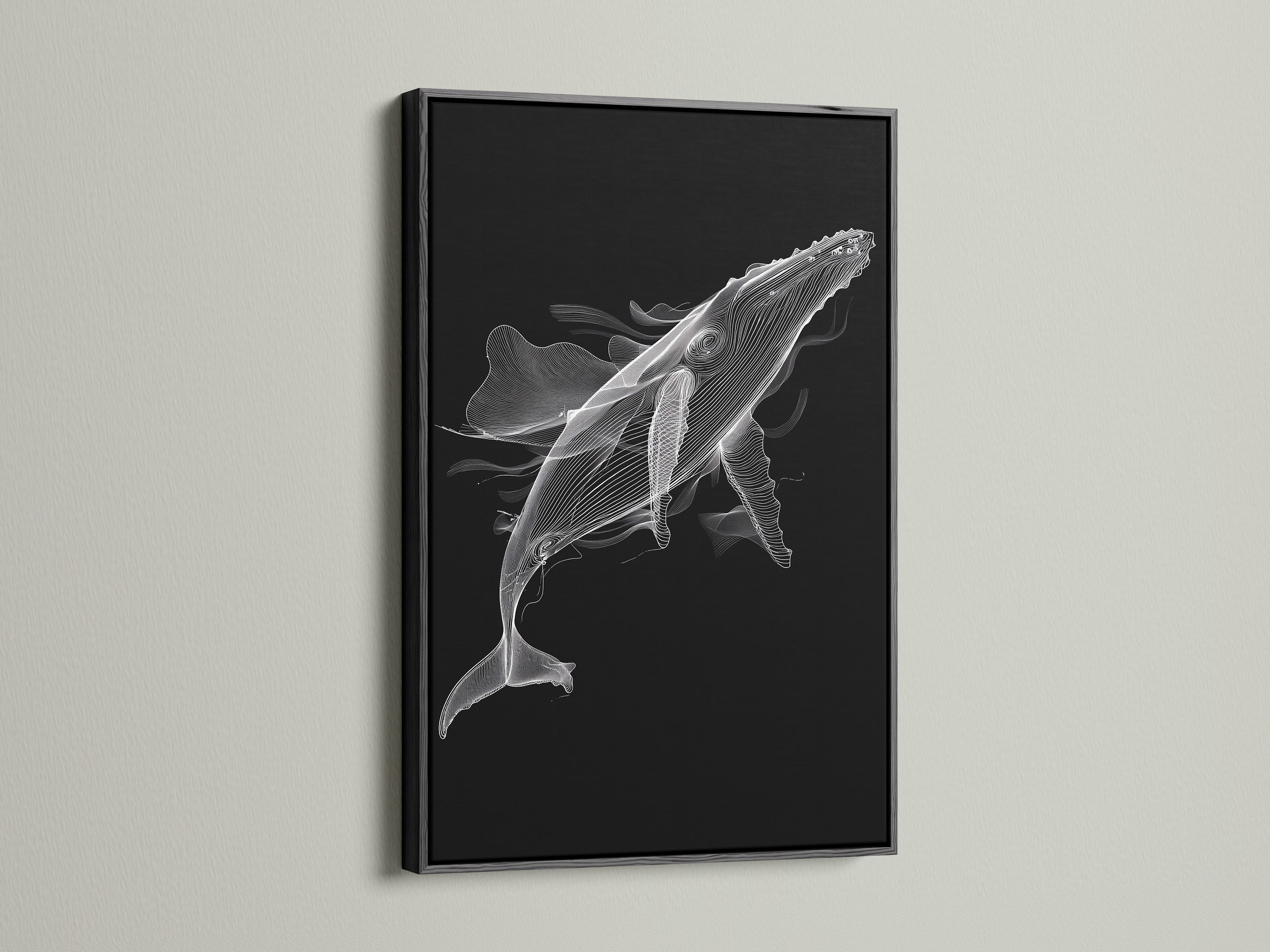 Displayed is a black and white whale artwork in a sleek black frame. This minimalist ocean canvas print offers a bold statement. Perfect for creating a modern and sophisticated space. The black frame adds contrast to the whale artwork. Enhance your living room wall art today.
