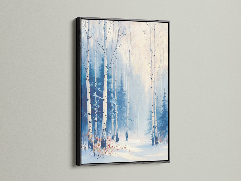 The Winter Forest canvas print is displayed in a black frame. It is modern landscape artwork for entryway decor. Renters and business owners will love this blue snowy birch tree wall art. This art is great for studios lobbies and waiting rooms.