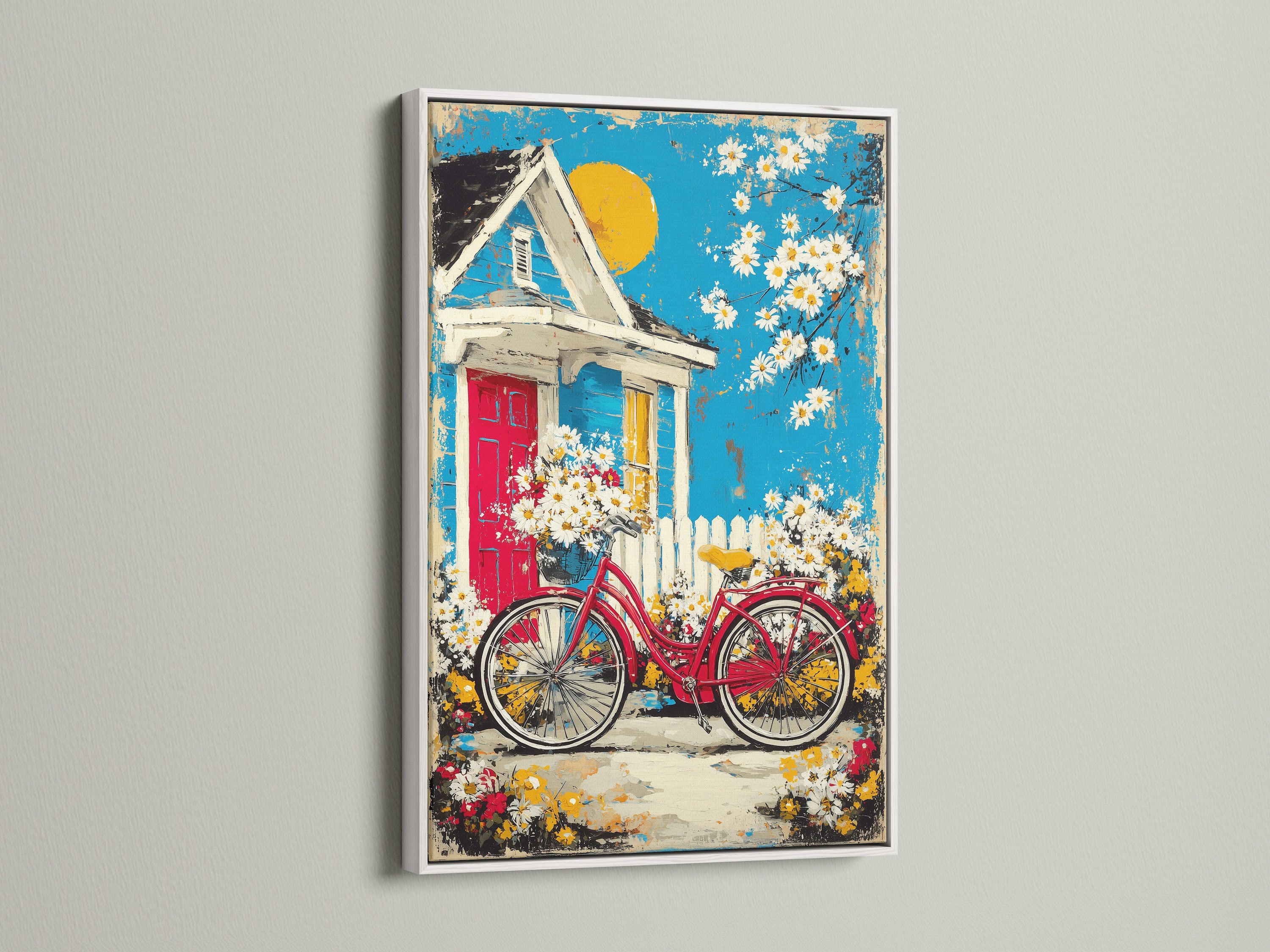 A beautiful Cottage Garden artwork is framed in white. The artwork features a vintage red bicycle leaning against a quaint cottage. This white frame enhances the artwork's bright colors. Perfect floral wall art for any room.