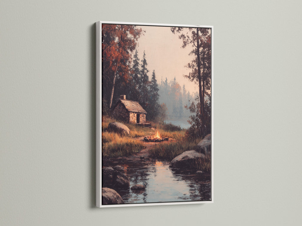 Artwork of a cozy cabin by a lake is elegantly framed in white. A white frame adds a touch of sophistication to your art. Explore the beauty of white frames. It is ideal for any interior decor.