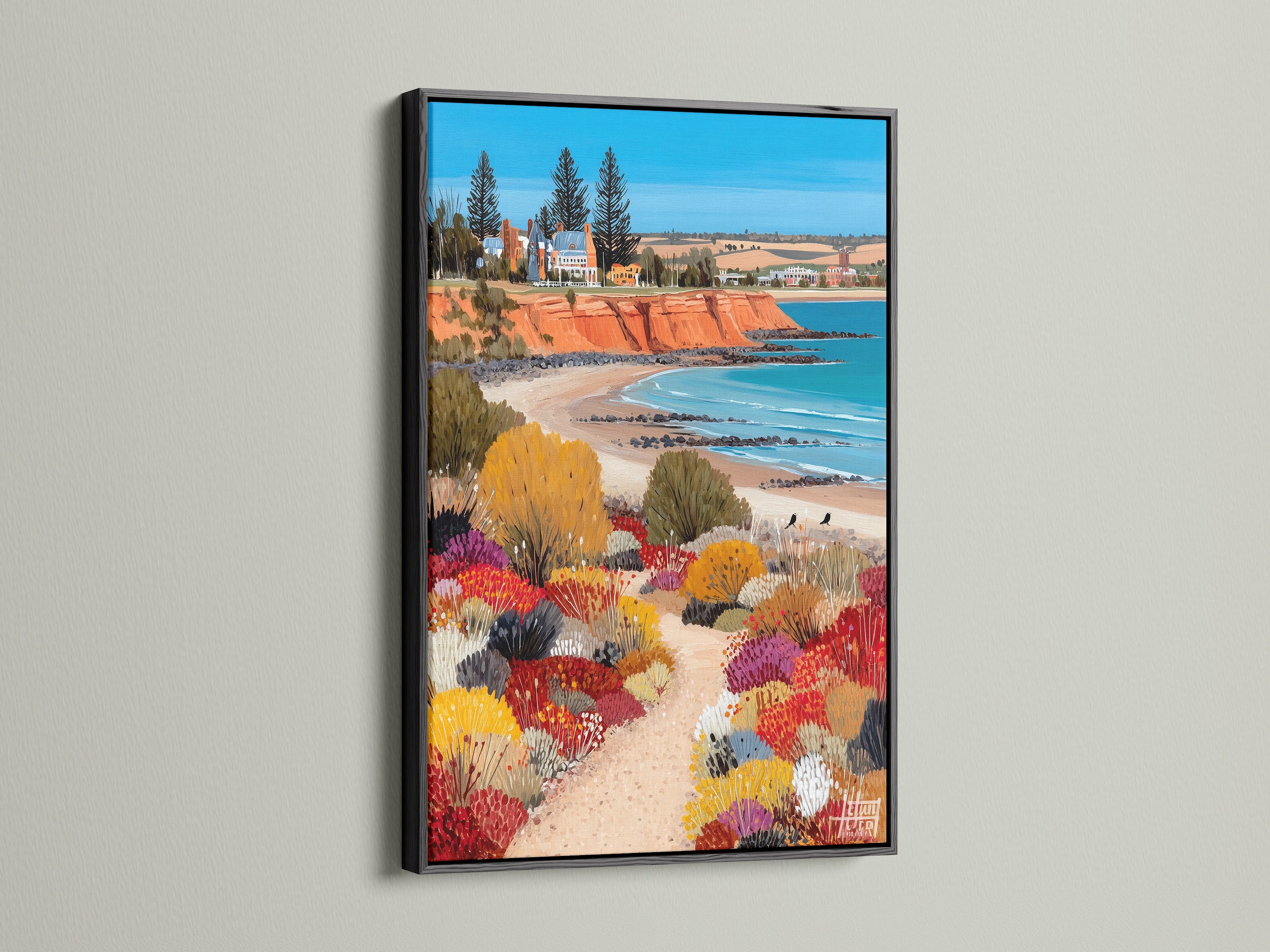 Coastal landscape artwork displayed in a sleek black frame. This modern seascape print brings a touch of the Australian beach to your home. The black frame enhances the colorful artwork. It makes it a standout piece for any wall. Perfect for those seeking elevated coastal wall art. Get yours today.