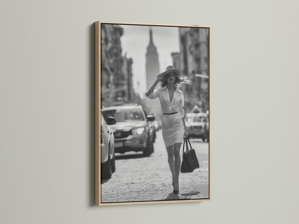 Enhance your artwork with our oak frame. This frame highlights a black and white photograph of a woman walking in a city. Our oak frames add warmth and sophistication to any room. Find the ideal frame for your cherished art.