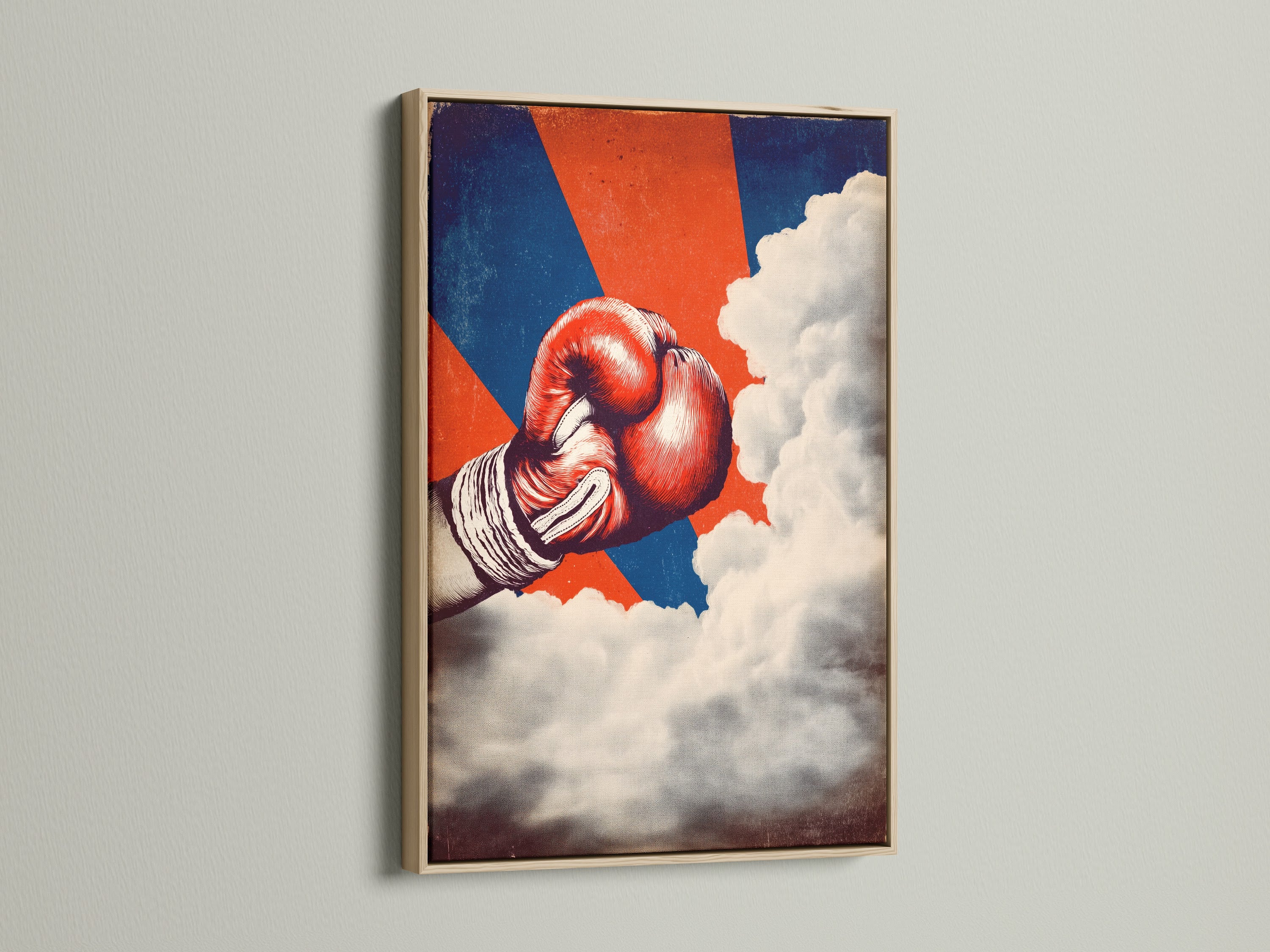 A vintage boxing glove artwork is elegantly framed in oak. This retro fight poster enhances your man cave decor. The sports wall art brings a vintage touch to any space. Red and blue art creates a classic boxing atmosphere.