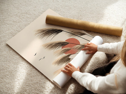 A woman carefully rolling a fine art poster paper print of pampas grass artwork. Highlighting the delicate handling of the botanical art. This minimalist print is perfect for creating a serene bedroom wall decor. Ideal for adding a touch of nature to any space. The fine art poster paper ensures a high-quality finish.