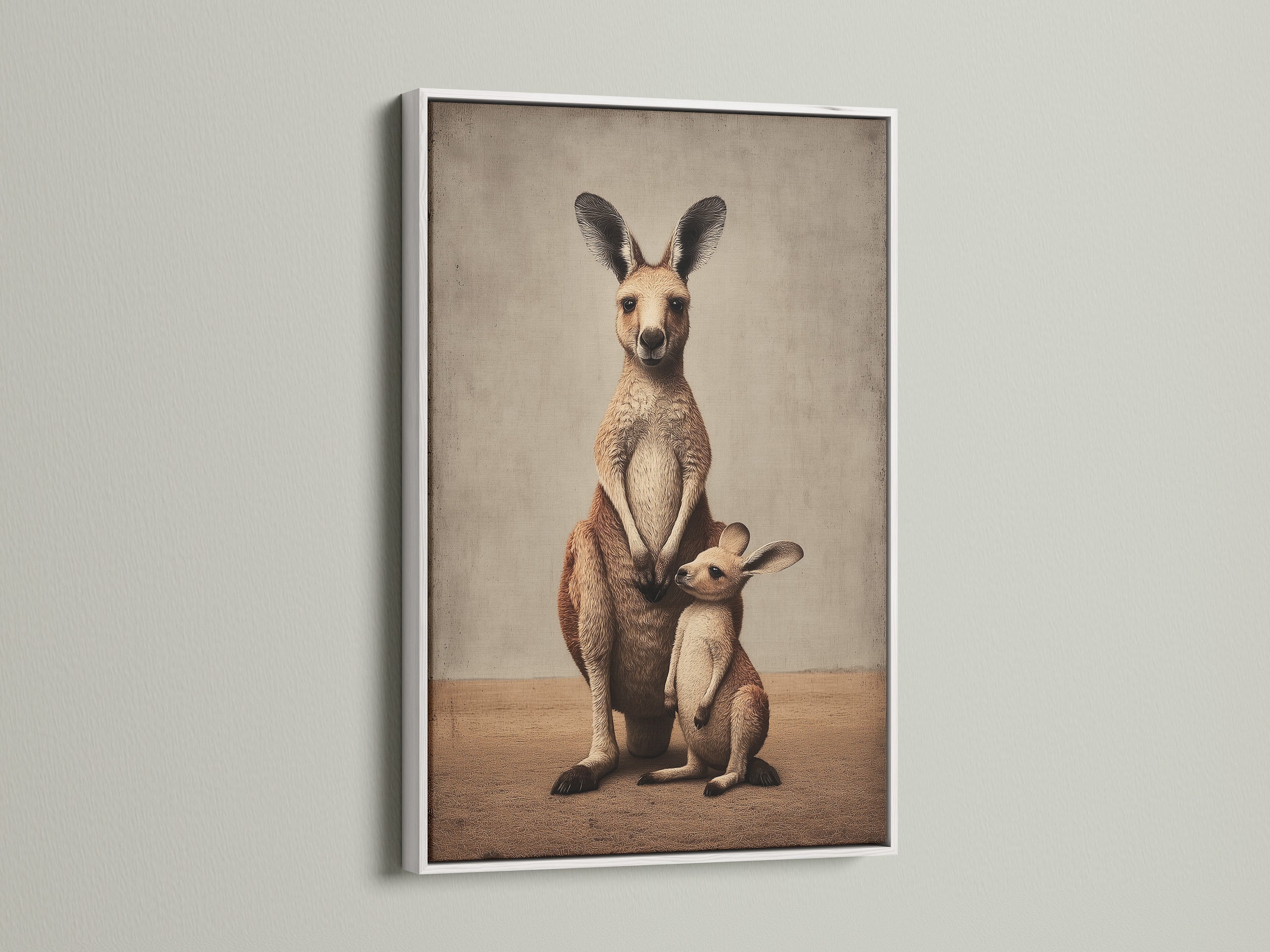 A kangaroo and joey artwork is showcased in a white frame. This neutral piece complements minimalist and Scandinavian styles. The family wall art brightens any nursery decor.